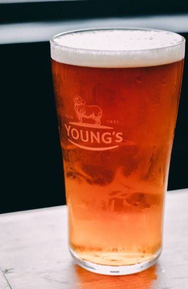A pint of Young's bitter served cold